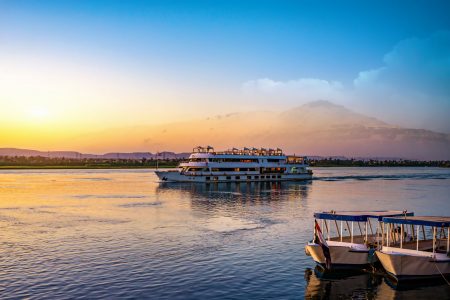 River,Nile,And,Ship,At,Sunset,In,Aswan