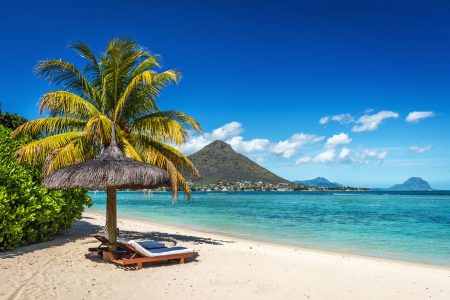 Loungers,And,Umbrella,On,Tropical,Beach,In,Mauritius,Island,,Indian